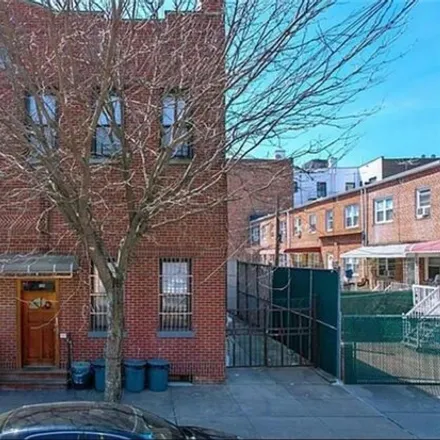 Buy this 8 bed house on 1518 70th Street in New York, NY 11228