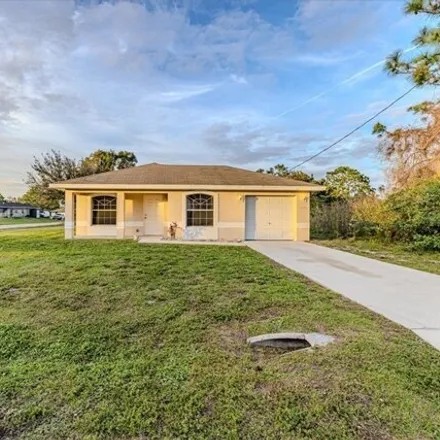 Buy this 3 bed house on Olive Avenue North in Lehigh Acres, FL