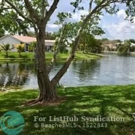 Rent this 2 bed townhouse on 9478 Palm Circle South in Pembroke Pines, FL 33025