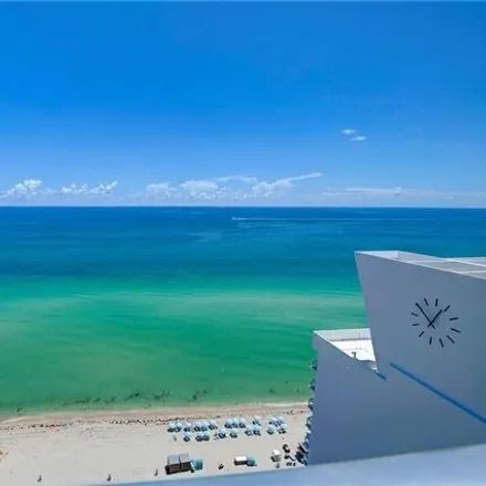 Image 1 - The Carillon Hotel & Spa, 6899 Collins Avenue, Atlantic Heights, Miami Beach, FL 33141, USA - Condo for rent