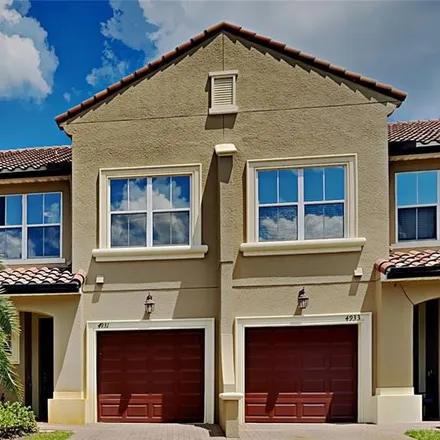 Buy this 3 bed townhouse on 4951 Luge Lane in Orlando, FL 32839