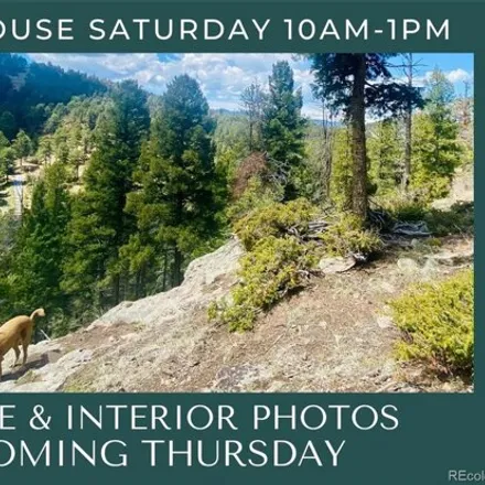 Buy this 3 bed house on 25157 Red Cloud Drive in Conifer, CO 80433