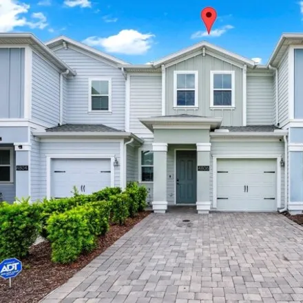 Buy this 3 bed townhouse on 4806 Tribute Trl in Kissimmee, Florida