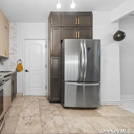 Rent this 3 bed apartment on 58-17 Penrod Street in New York, NY 11368