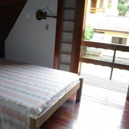 Rent this 3 bed house on Caraguatatuba
