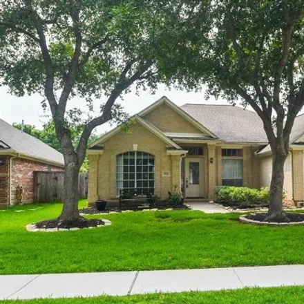 Rent this 4 bed house on 1723 Wind Trace Cove in Sugar Land, TX 77479