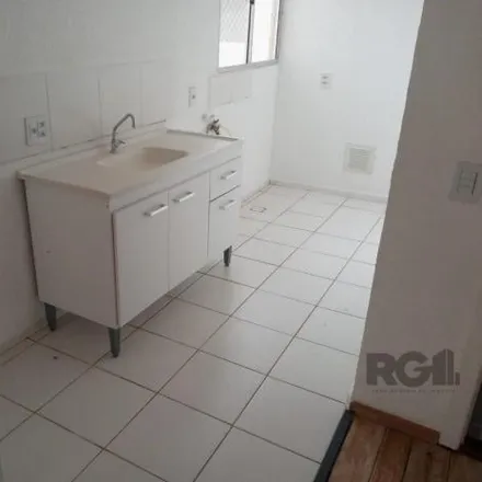 Buy this 2 bed apartment on Avenida Família Gonçalves Carneiro in Cavalhada, Porto Alegre - RS