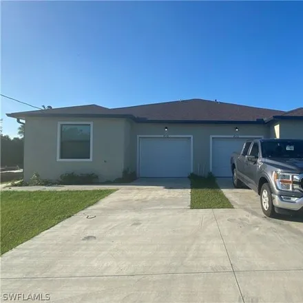 Rent this 2 bed house on 400 Grant Boulevard in Lehigh Acres, FL 33974