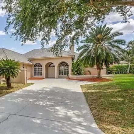 Buy this 3 bed house on 11799 Pinewood Lakes Drive in Gateway, FL 33913