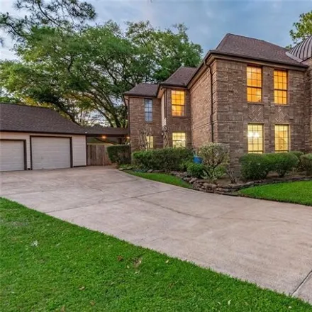 Rent this 4 bed house on 15701 Pinewood Cove Drive in Houston, TX 77062