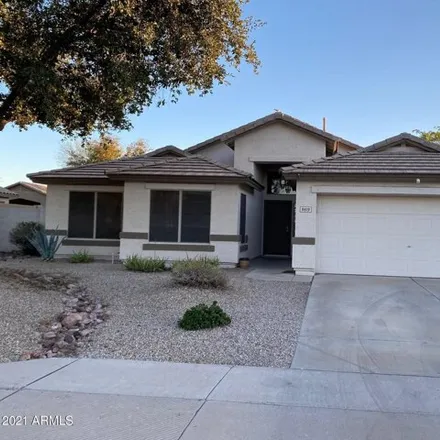 Rent this 4 bed house on 9619 East Onza Avenue in Mesa, AZ 85212