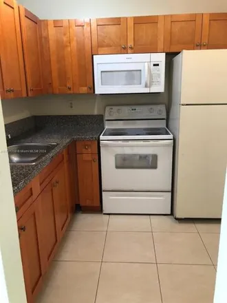 Buy this 2 bed condo on 484 Northwest 161st Street in Miami-Dade County, FL 33169