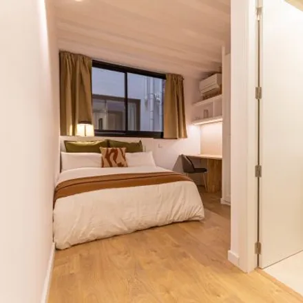 Rent this 4 bed room on La perla negra in Carrer de l'Espanya Industrial, 14