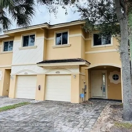 Rent this 3 bed house on 4391 Berkshire Wharf Drive in Palm Beach Villas II, Palm Beach County
