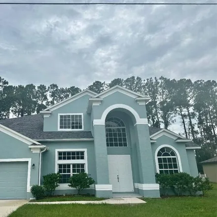 Buy this 4 bed house on 91 Pickering Drive in Palm Coast, FL 32164