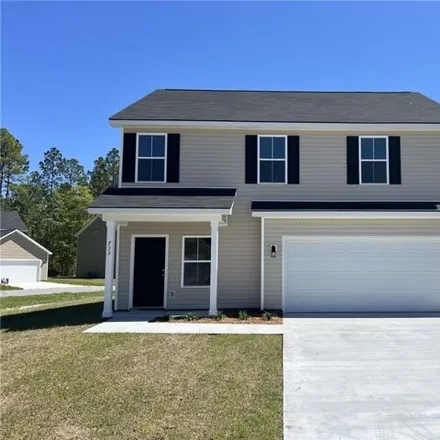 Buy this 4 bed house on 751 Mill Creek Circle in Mill Creek, Hinesville