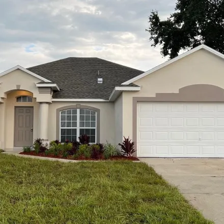 Buy this 4 bed house on 108 Southwest Oakridge Drive in Port Saint Lucie, FL 34984