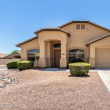 Rent this 4 bed house on 10433 West Albeniz Place in Phoenix, AZ 85353