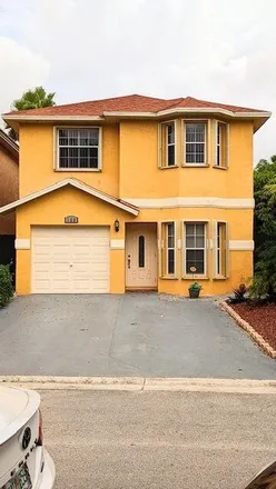 Rent this 3 bed house on 140 Plumage Lane in West Palm Beach Farms, Palm Beach County