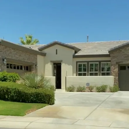 Rent this 3 bed house on 60945 Living Stone Drive in La Quinta, CA 92247