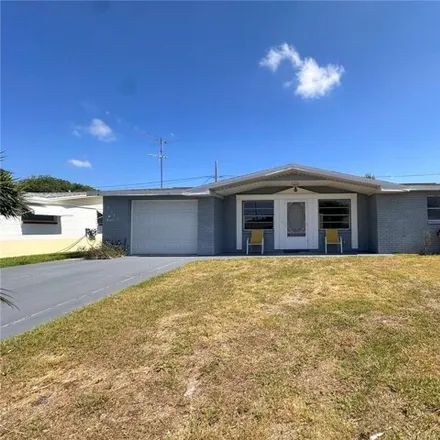 Buy this 2 bed house on 5169 Tilson Drive in Elfers, FL 34652