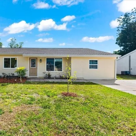 Buy this 5 bed house on 6639 Electra Avenue in North Port, FL 34287
