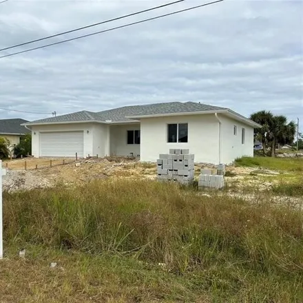 Buy this 3 bed house on 3723 Northeast 16th Place in Cape Coral, FL 33909