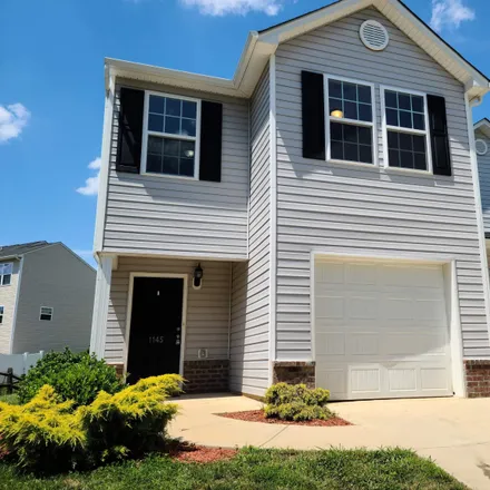 Buy this 3 bed townhouse on 1129 Brooksridge Way in Guilford County, NC 27377