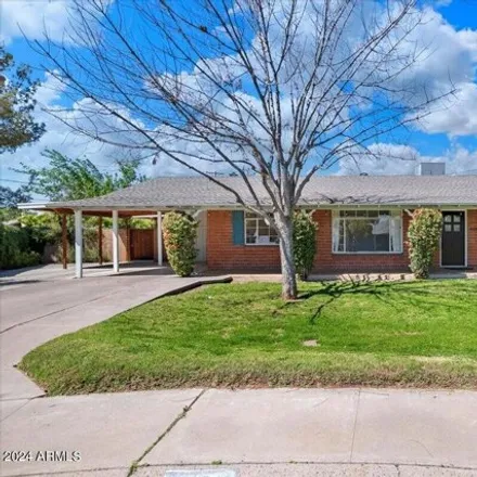 Rent this 4 bed house on 3722 East Fairmount Avenue in Phoenix, AZ 85018