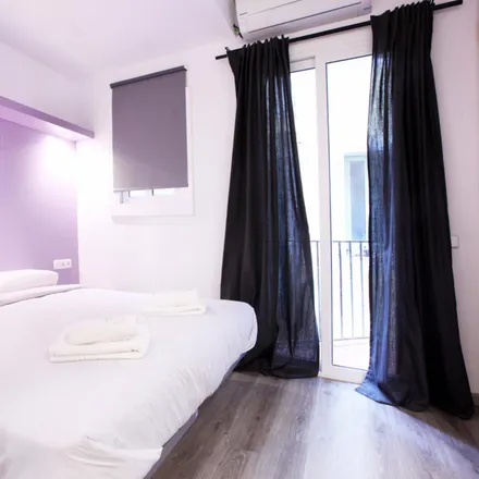 Rent this 1 bed room on Carrer de Picalquers in 10, 08001 Barcelona