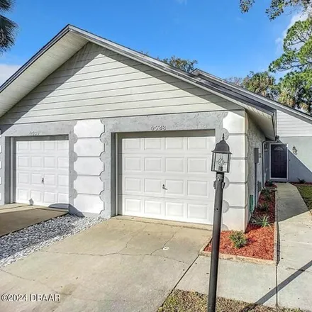 Rent this 2 bed townhouse on 4528 Nettle Creek Court in Port Orange, FL 32127