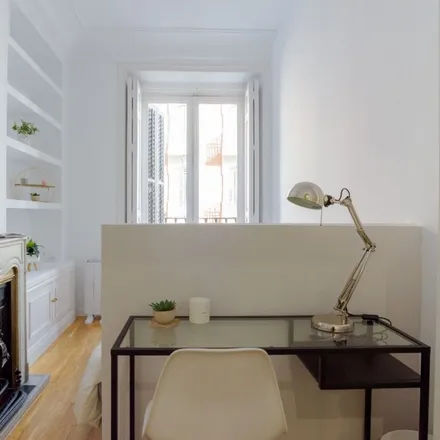 Rent this 9 bed room on Calle de Valenzuela in 10, 28014 Madrid
