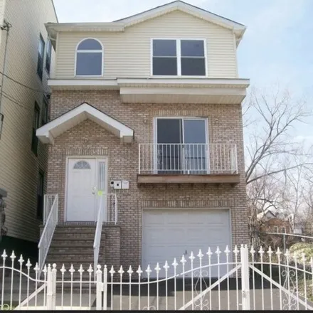 Rent this 3 bed apartment on 671 Hunterdon Street in Newark, NJ 07108