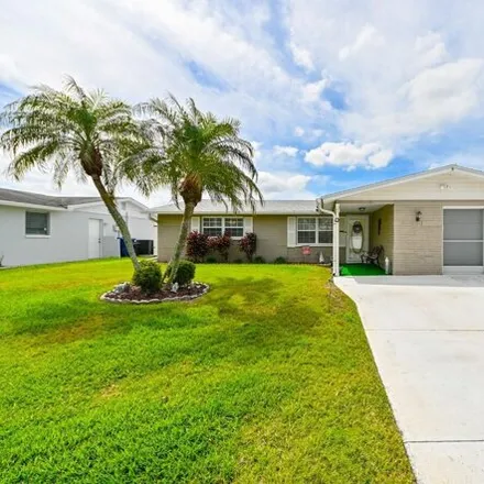 Buy this 2 bed house on 4241 Sunray Drive in Holiday, FL 34691