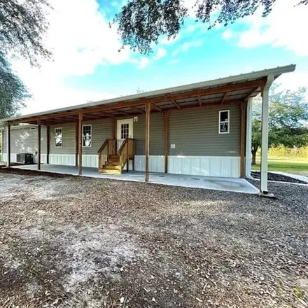 Rent this studio apartment on 12216 Kent Grove Drive in Fivay Junction, Pasco County