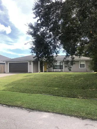 Buy this 3 bed house on 502 Northwest Goldcoast Avenue in Port Saint Lucie, FL 34983
