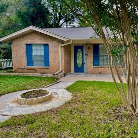 Rent this 3 bed house on 7202 Geneva Drive in Austin, TX 78752
