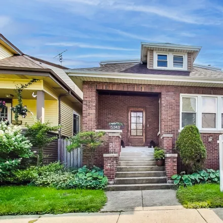 Buy this 4 bed house on 5337 West Carmen Avenue in Chicago, IL 60630