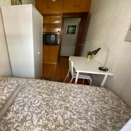 Rent this 4 bed room on Calle San Anselmo in 28018 Madrid, Spain