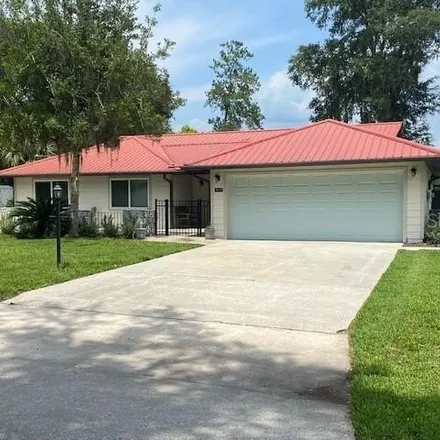 Rent this 3 bed house on Ocala National Golf Club in 4782 Northwest 80th Avenue, Ocala