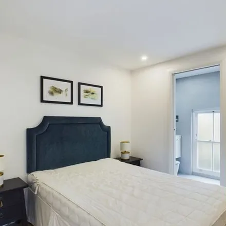Rent this 4 bed townhouse on 27 Sterne Street in London, W12 8AB