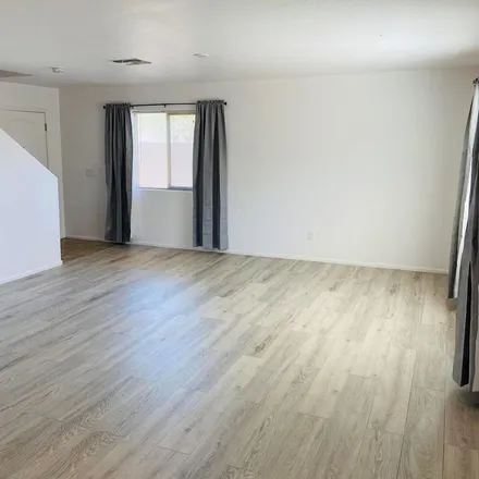 Rent this 4 bed apartment on 23975 North Mirage Avenue in Pinal County, AZ 85132