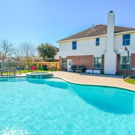 Buy this 4 bed house on 5811 Mills Point Ln in Richmond, Texas