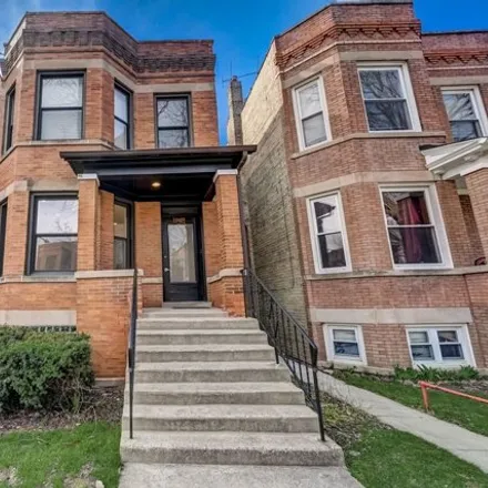 Buy this 4 bed house on 3616 North Albany Avenue in Chicago, IL 60625