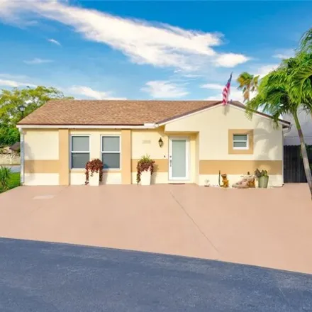 Buy this 3 bed house on 19909 Northwest 67th Court in Hialeah Gardens, FL 33015