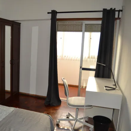 Rent this 5 bed room on Farmácia Gouveia in Rua Augusto Costa 6 A, 1500-998 Lisbon