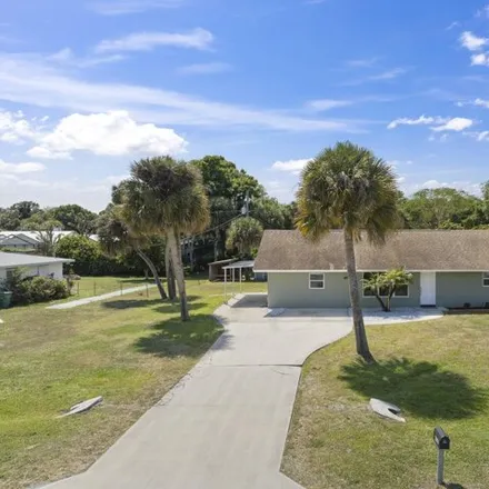 Buy this 3 bed house on 6505 Fort Pierce Boulevard in Lakewood Park, FL 34951