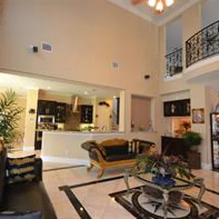 Rent this 4 bed apartment on 5215 Turning Leaf Lane in Sugar Land, TX 77479