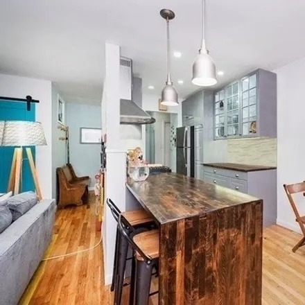Buy this studio apartment on 47-42 46th Street in New York, NY 11377