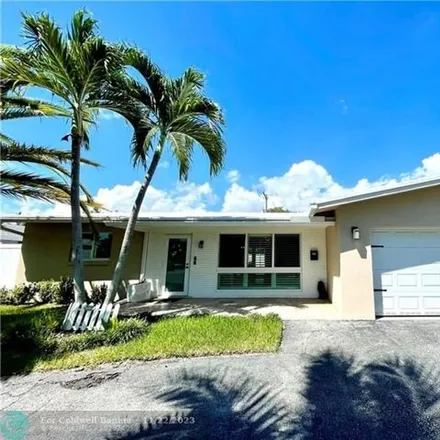 Rent this 3 bed house on 5703 Northeast 16th Terrace in Imperial Point, Fort Lauderdale